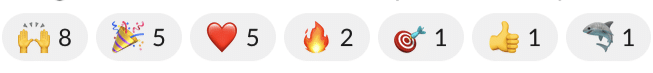 Row of reaction emojis with counts, including clapping hands, party popper, heart, fire, and thumbs up.